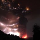 Wildfire Night Scene: Lightning, Red Glow, Smoke Clouds in Forest