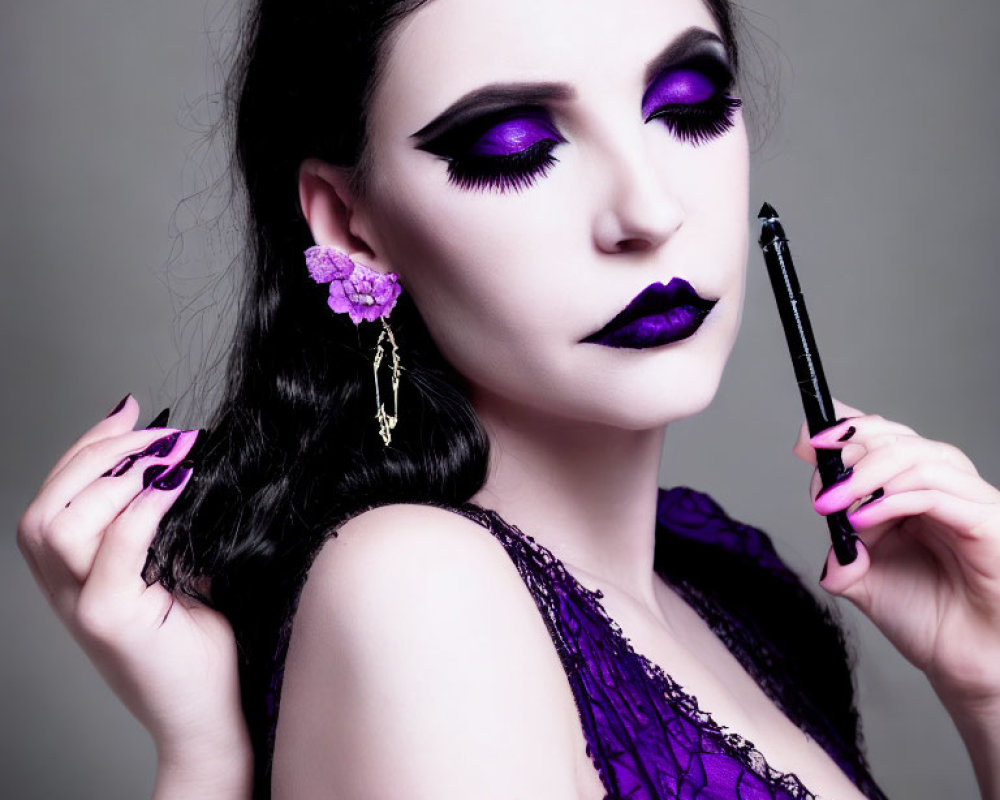 Woman with Dramatic Purple Makeup Holding Makeup Pencil