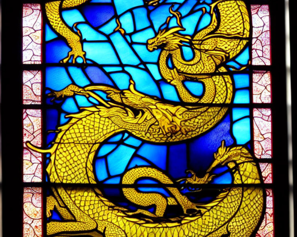 Golden dragon stained glass window on deep blue background