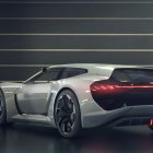 Sleek Silver Sports Car with Neon Lights and Oversized Wheels