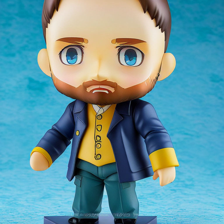 Colorful chibi-style man figurine with beard, blue eyes, navy jacket, yellow shirt,