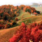 Vibrant autumn village scene with rolling hills and distant castles
