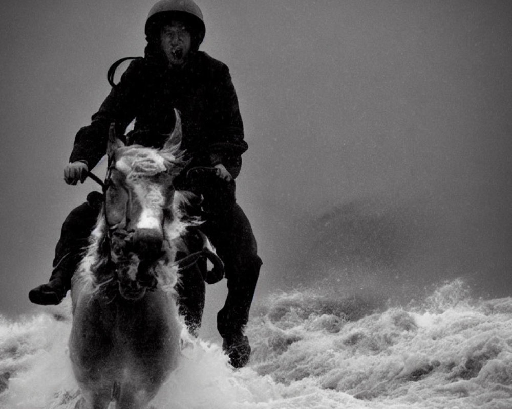Dramatic monochrome image of person on horseback in water