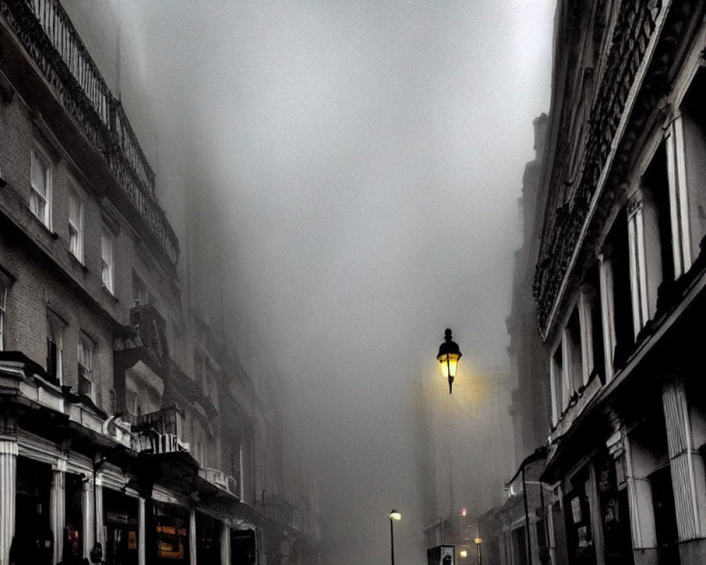 Foggy urban street with classic architecture and street lamps