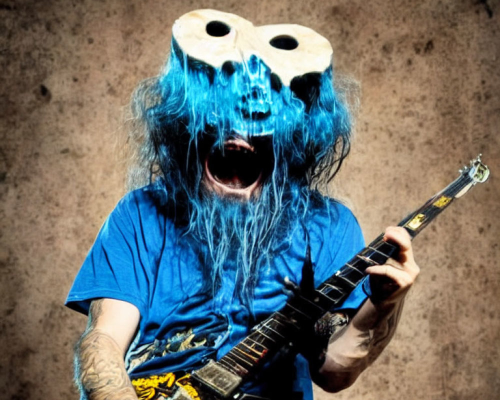 Person in Blue Wig and Skull Mask Playing Electric Guitar on Textured Backdrop