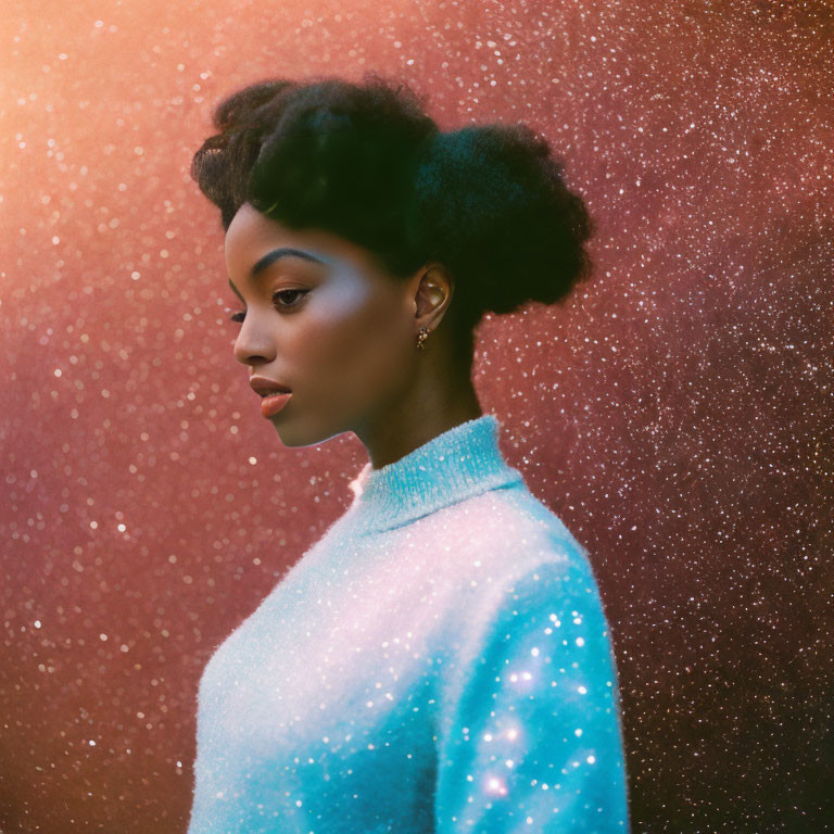Elegant woman with updo hairstyle in glittery blue turtleneck against cosmic backdrop