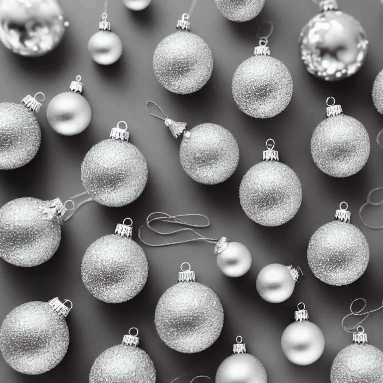 Glittery monochrome holiday ornaments with varying textures