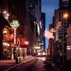 Vibrant night street scene with neon signs and lights