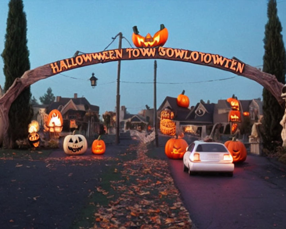 Car driving through Halloween-themed street with jack-o'-lanterns and skeletal figures.
