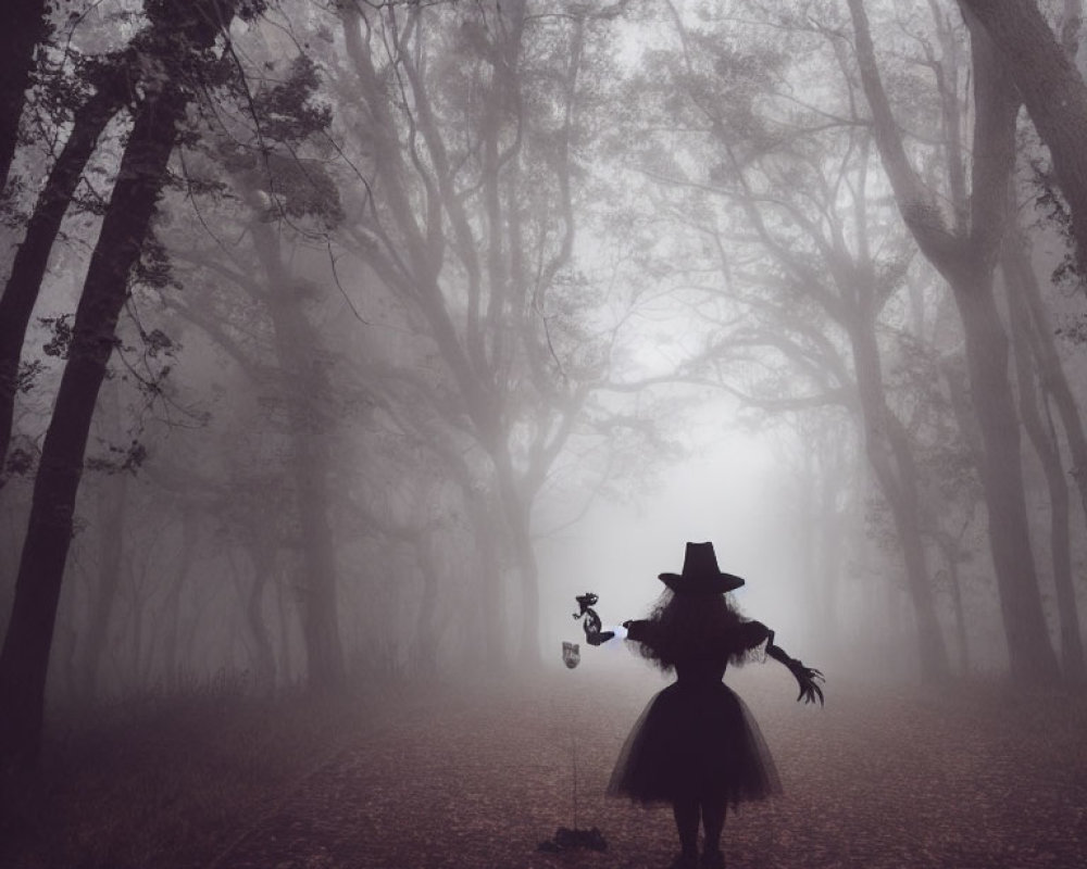 Spooky scarecrow in misty forest with bare trees
