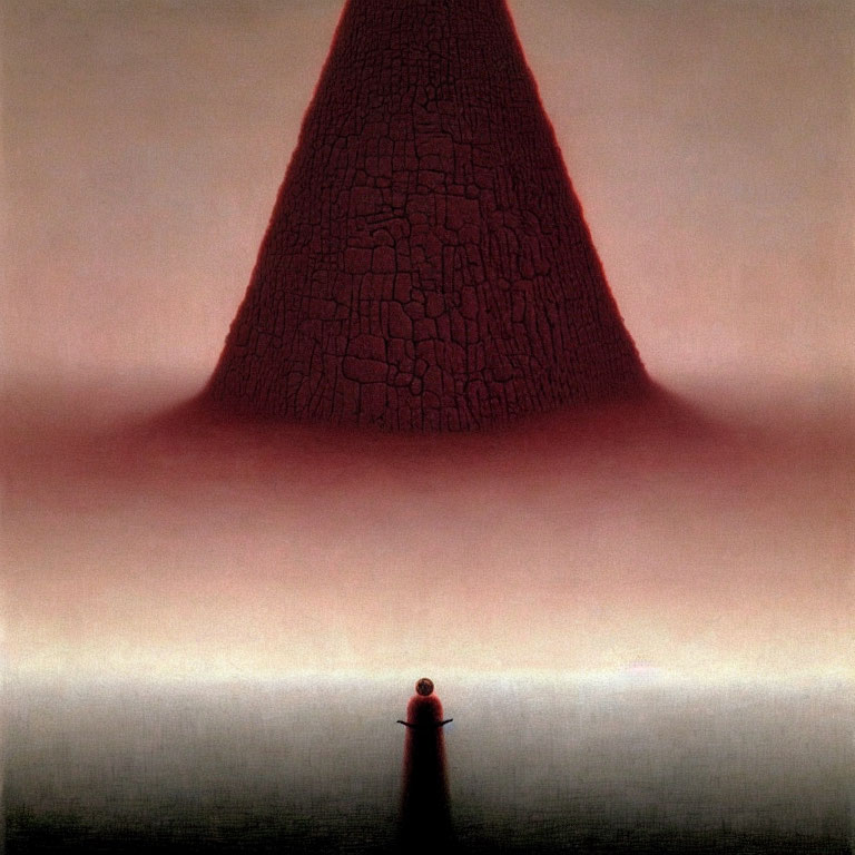 Solitary figure near red cracked-cone structure under gradient light