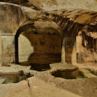 Ancient Roman bathhouse scene with people relaxing in water