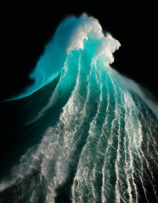 Towering Wave with Frothy White Foam against Dark Background