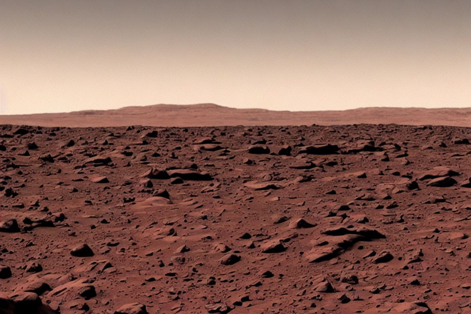 Barren Mars landscape with rocky surface and hazy sky