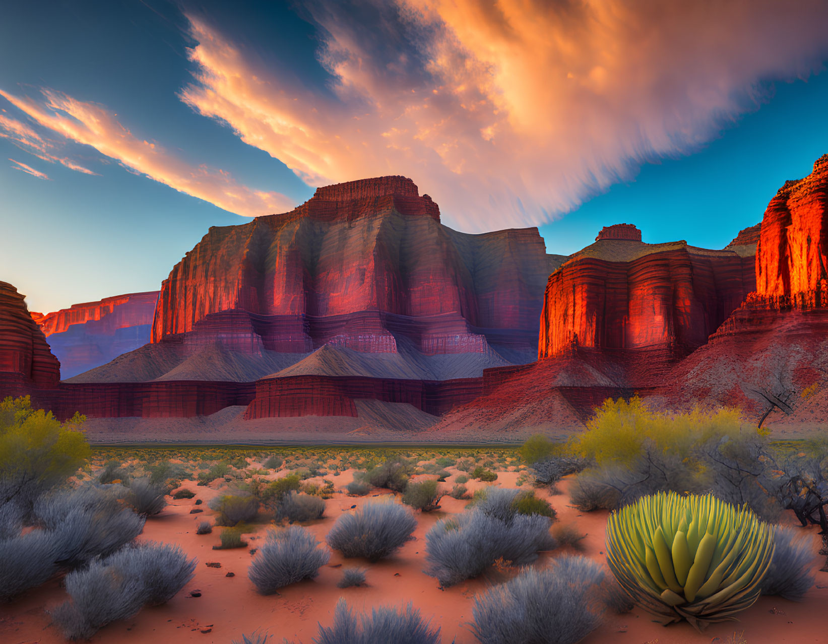 Scenic desert sunset with red rock formations and dramatic sky