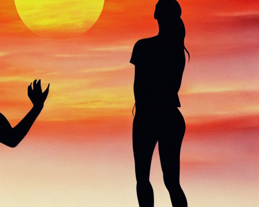 Two People Silhouetted Against Vibrant Sunset