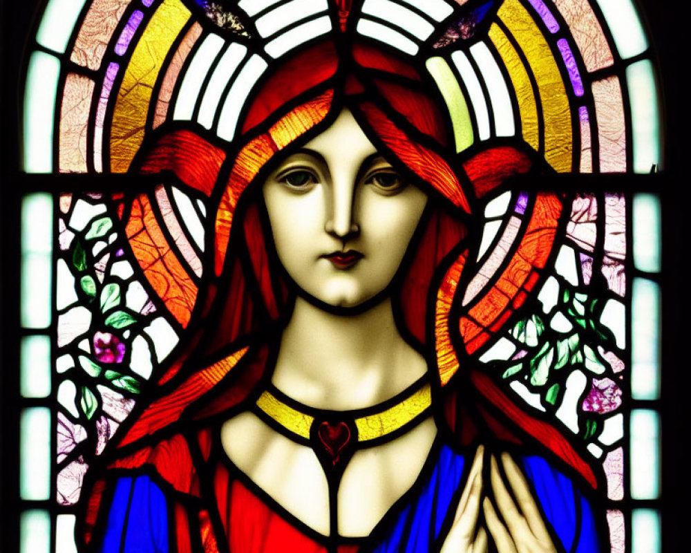 Colorful stained glass artwork of haloed figure with red and orange hair in blue and red robes.