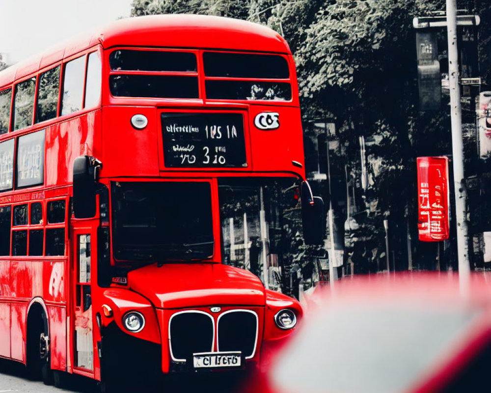Red Double-Decker Bus on Street with Selective Coloring