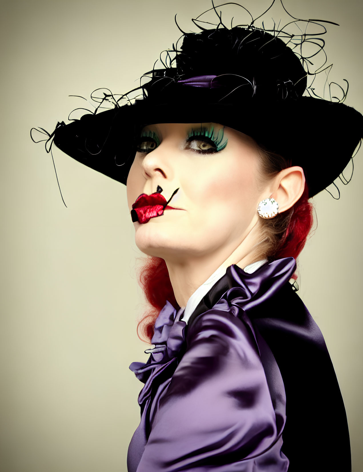 Dramatic makeup woman with black hat and red lipstick