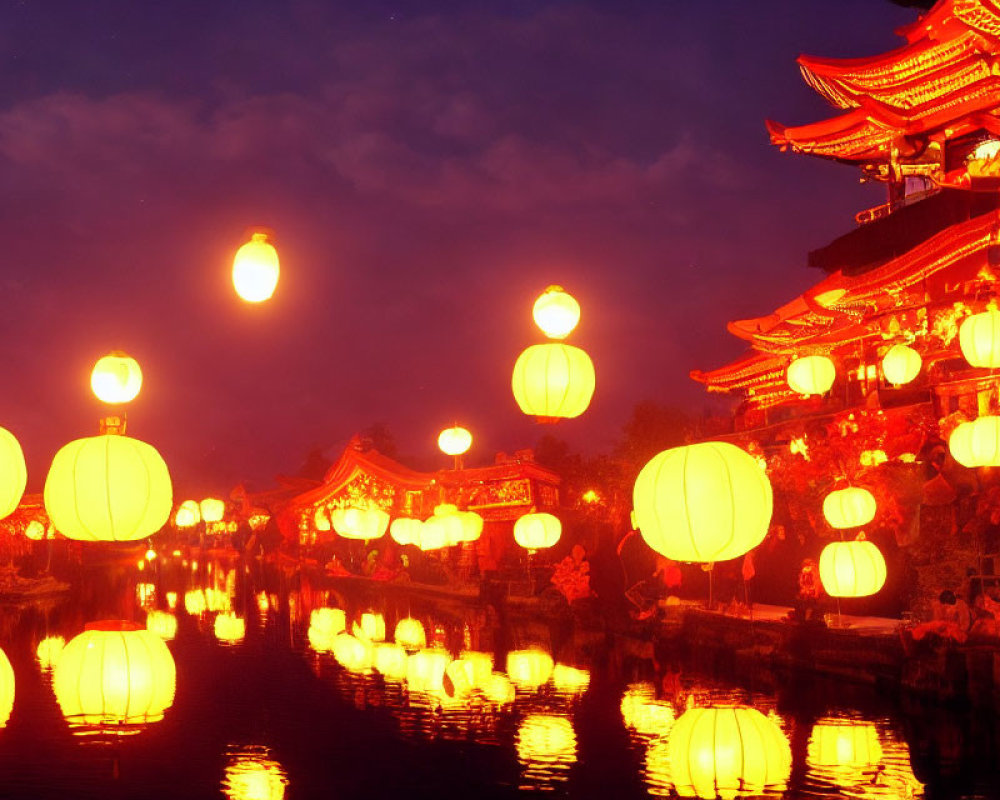 Traditional Chinese lanterns light up waterway and pagoda at twilight