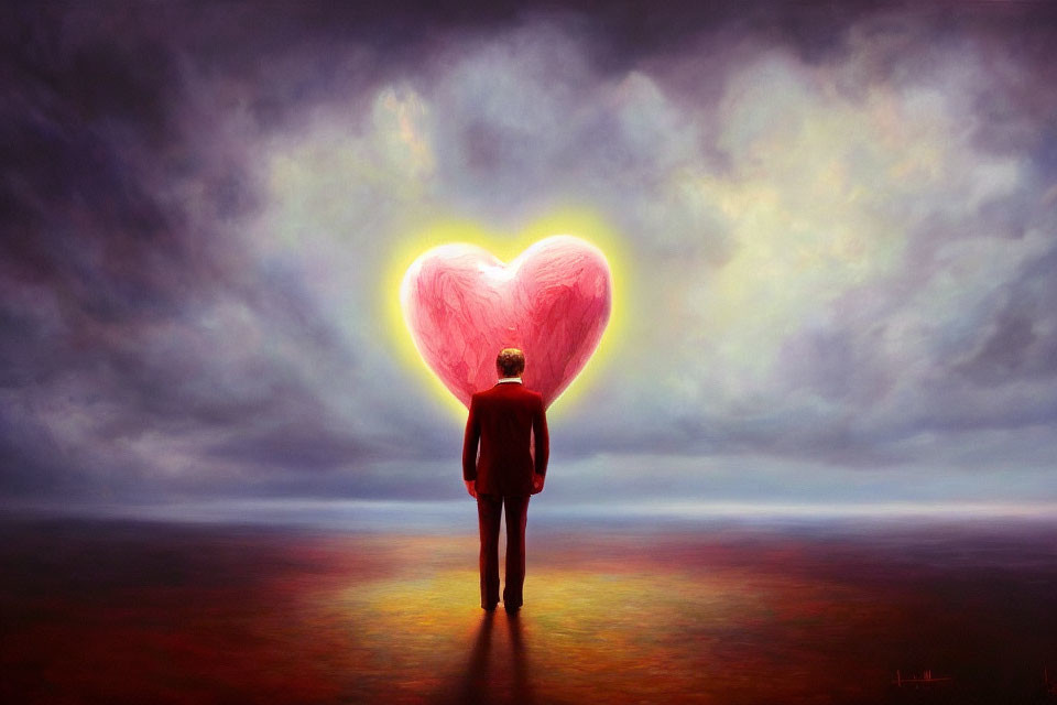 Man standing in front of glowing heart-shaped object on red and yellow background