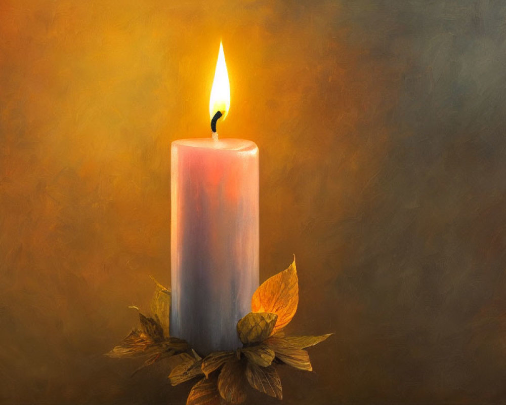 White Candle with Warm Glow on Orange and Gray Background with Dried Leaf Decoration