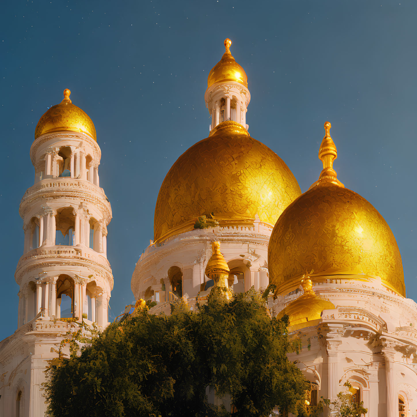 Grand building with illuminated golden domes and white tower under twilight sky.