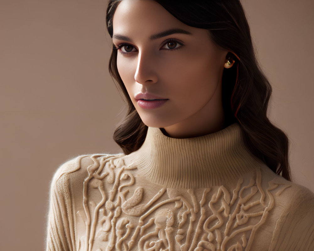 Dark-haired woman in turtleneck sweater with soft gaze and minimal makeup.