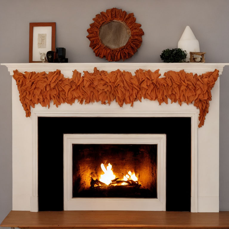 Warm Fireplace with White Mantelpiece and Autumn Decor