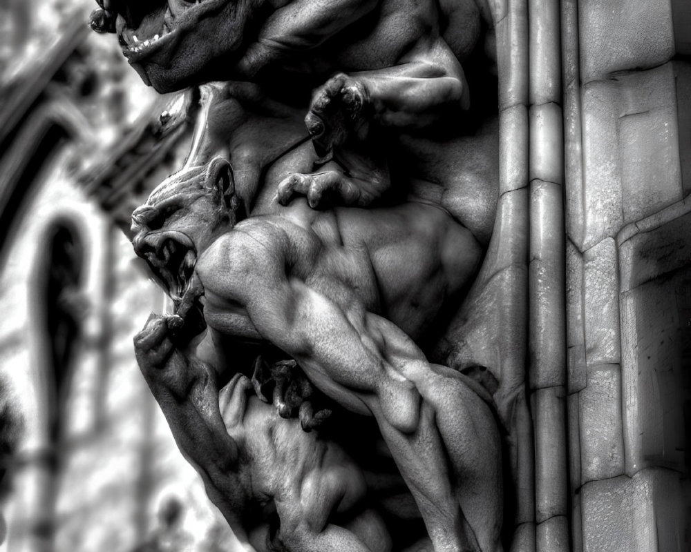 Monochrome Gothic gargoyle sculpture on cathedral depicting menacing creature