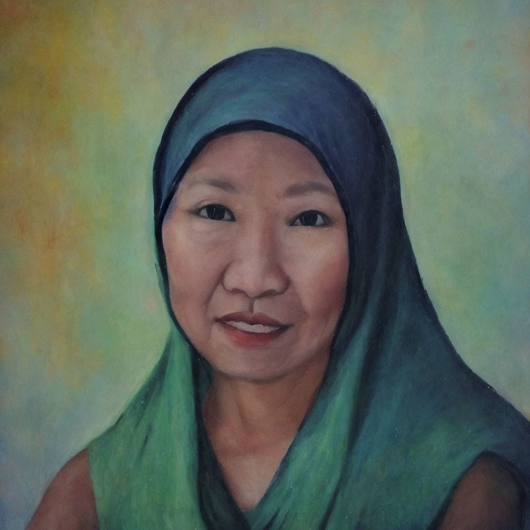 Smiling woman portrait with green headscarf