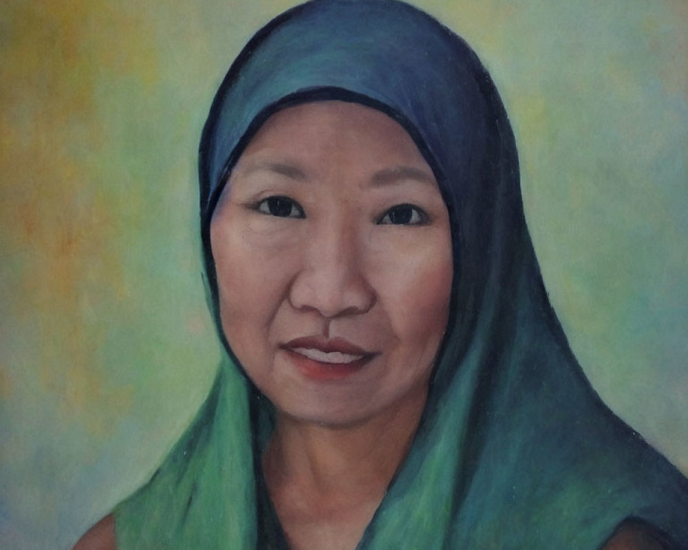 Smiling woman portrait with green headscarf
