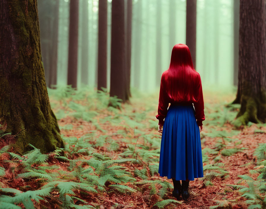 Woman with Red Hair in Misty Forest with Blue Skirt