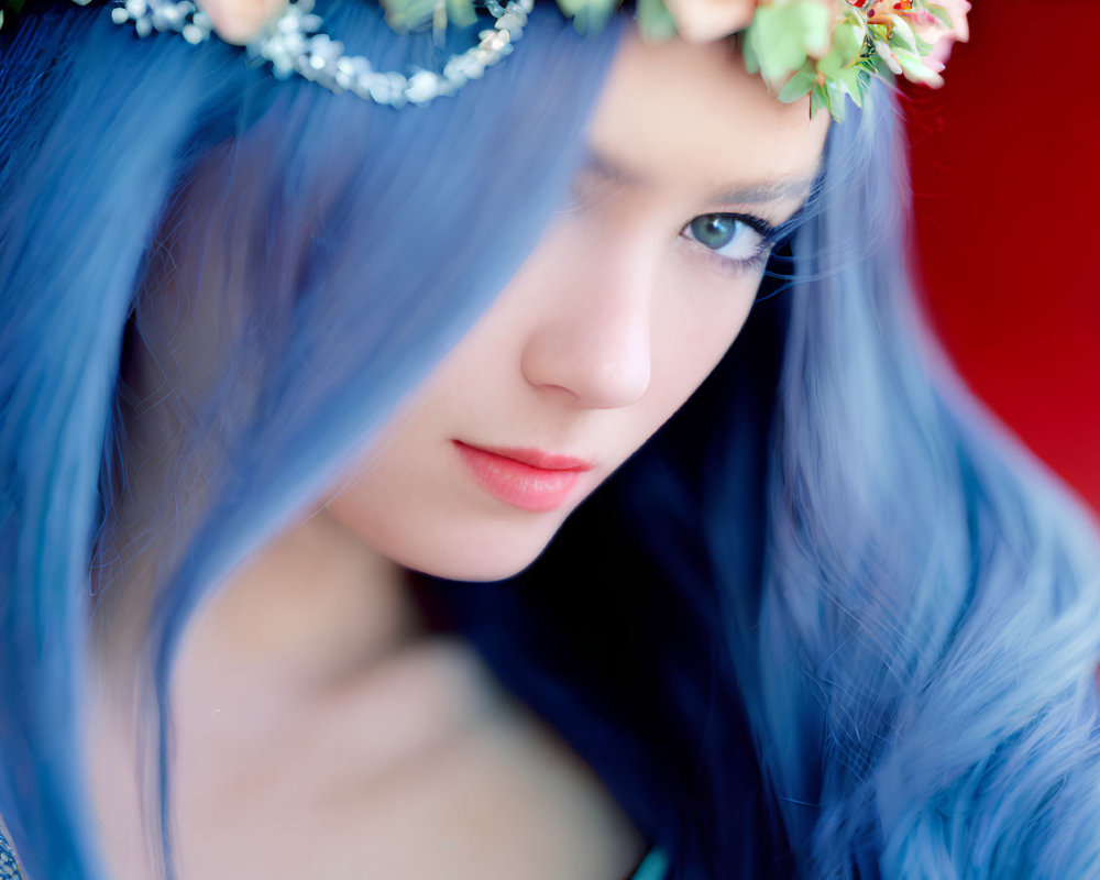 Vibrant Blue Hair with Floral Headband on Red Background