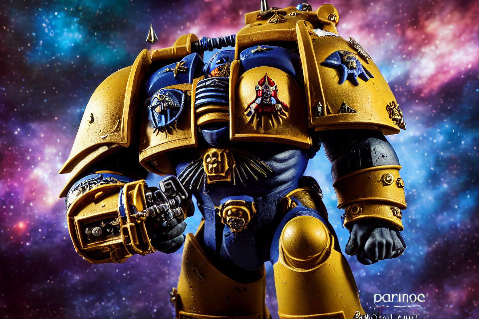 Detailed Warhammer 40K Space Marine Figurine in Blue and Gold Armor on Cosmic Background