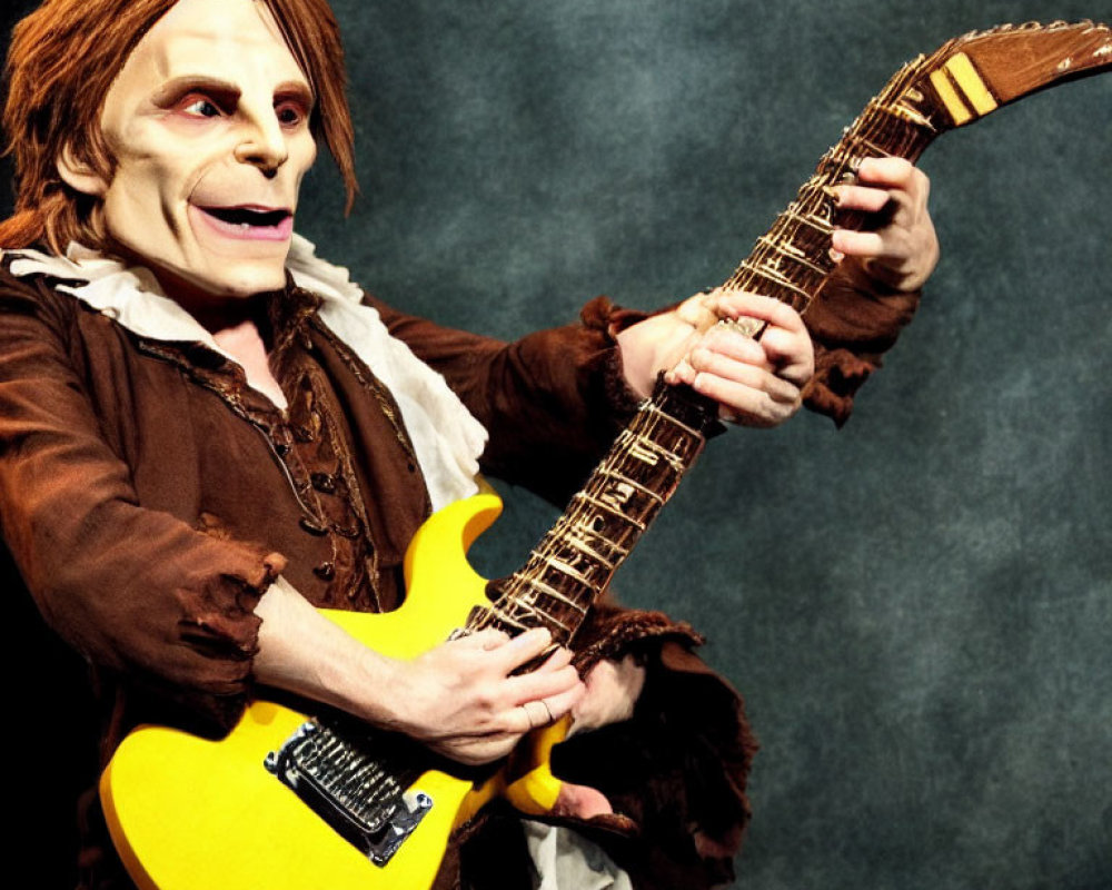 Elaborately Makeup Performer Playing Yellow Electric Guitar on Stage