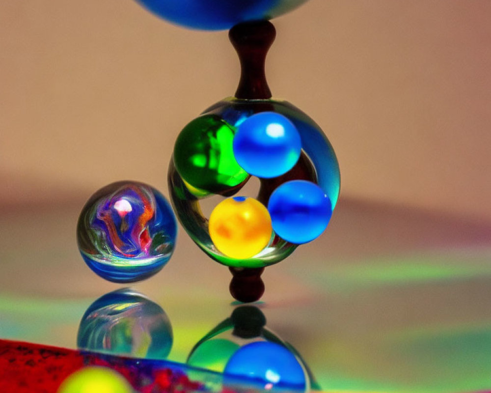 Vibrant marbles on glossy surface with blurred background
