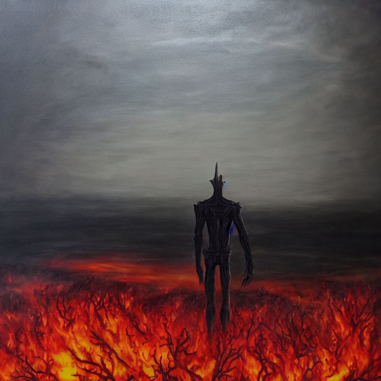 Dark silhouette in fiery landscape under gloomy sky