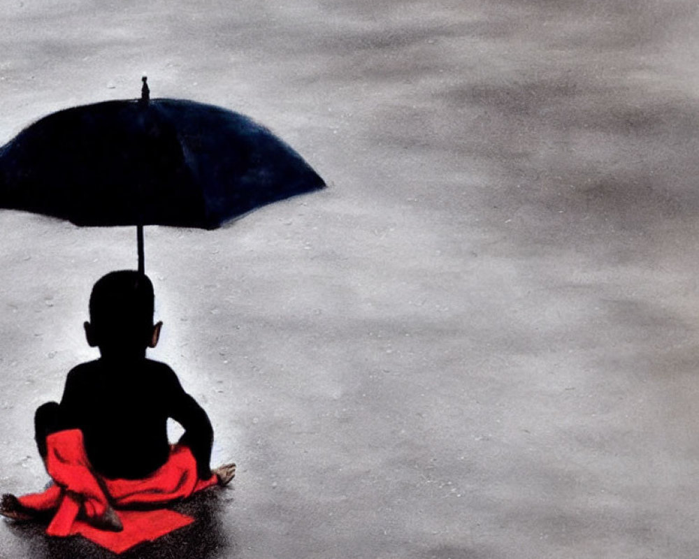 Child sitting under blue umbrella on gray surface in red garment