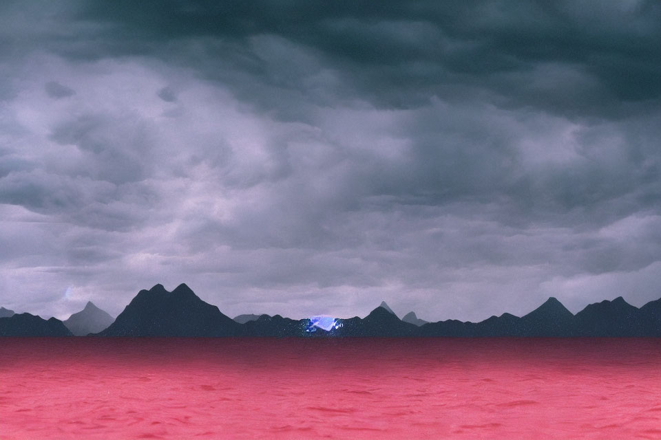 Surreal landscape with red ground, dark mountains, and stormy sky
