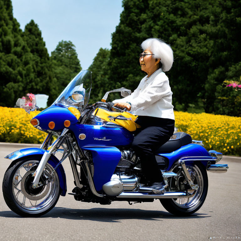 Elderly Woman on Blue Motorcycle Surrounded by Nature
