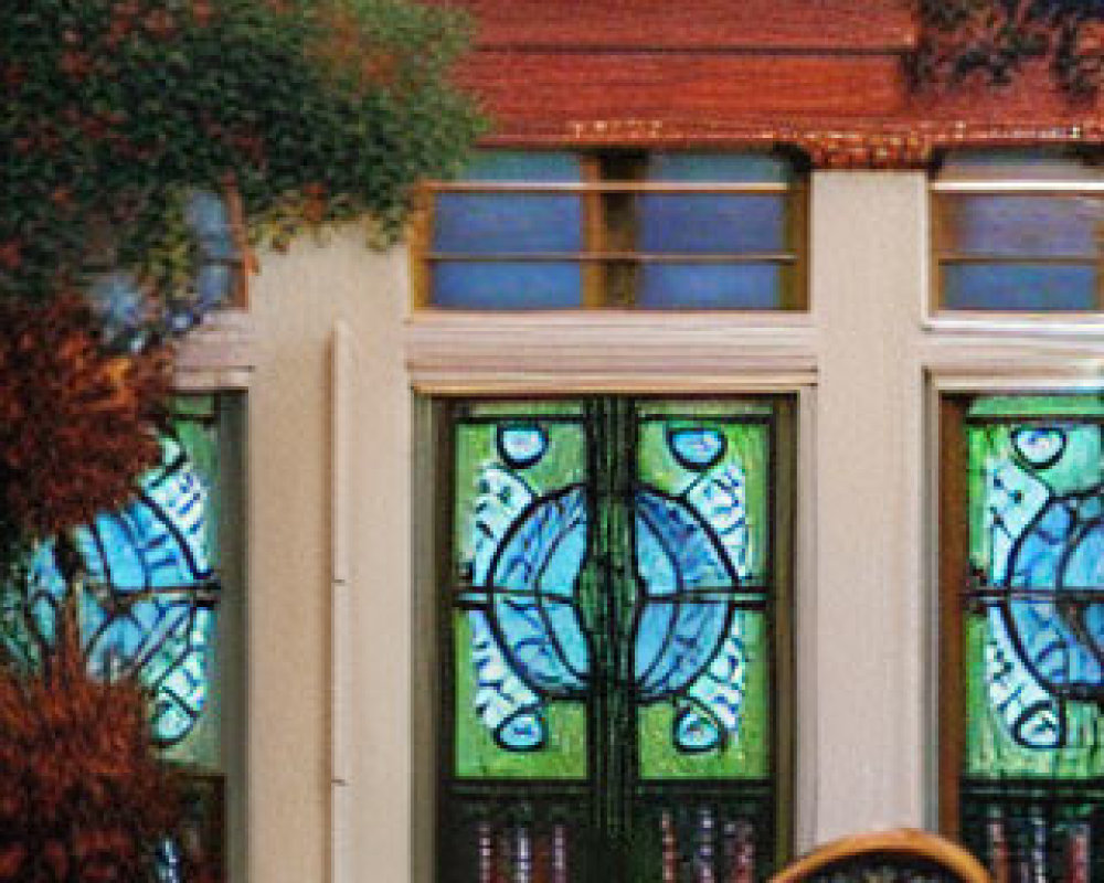 Intricately Designed Stained Glass Door with Classical Architecture