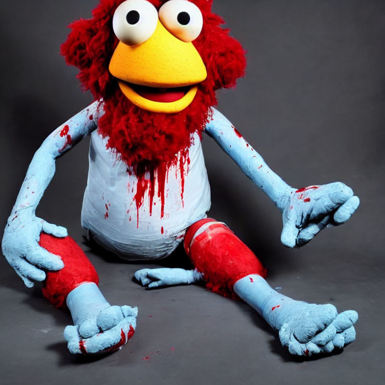 Disheveled Elmo Plush Toy Sitting Position