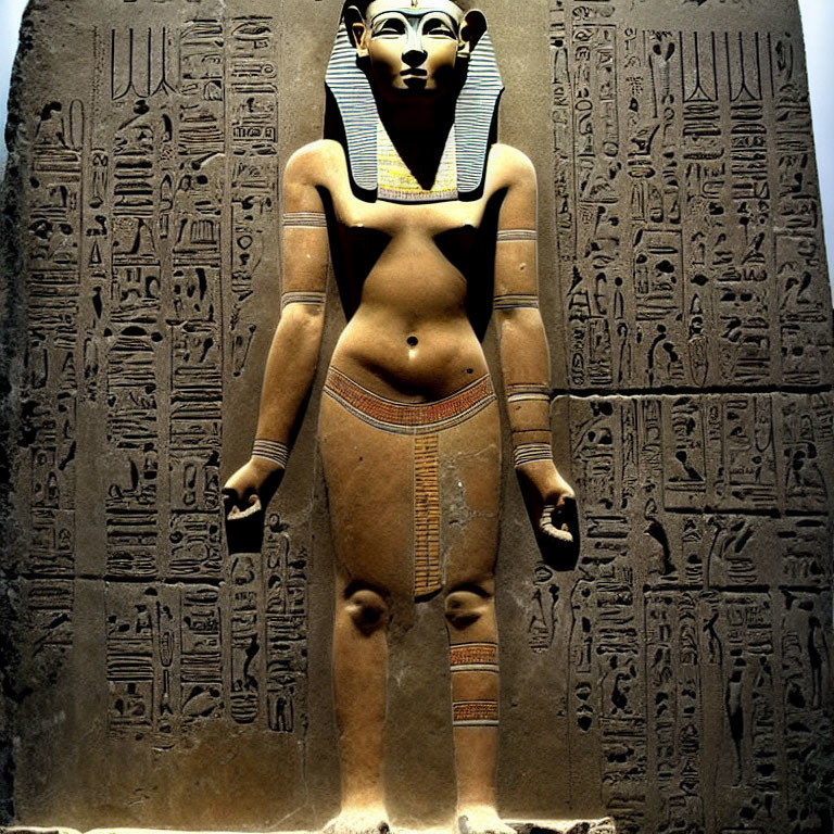 Ancient Egyptian Pharaoh Statue with Traditional Headdress and Hieroglyphics
