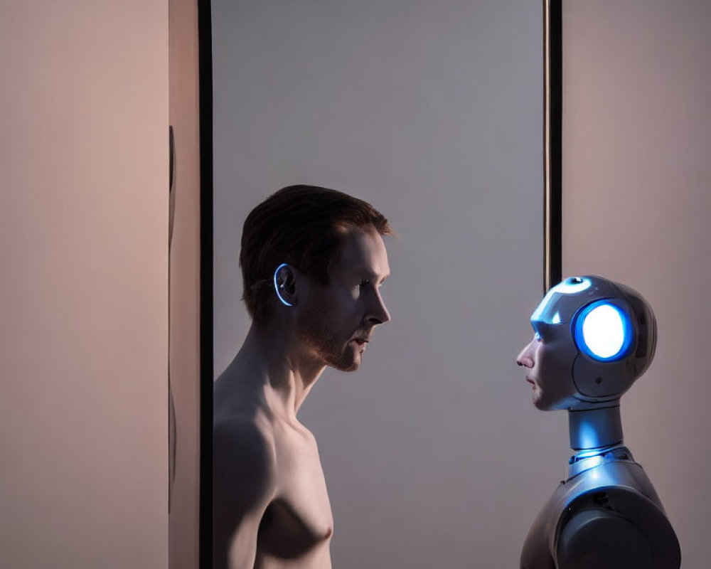 Shirtless man and humanoid robot mirror profiles in contrast