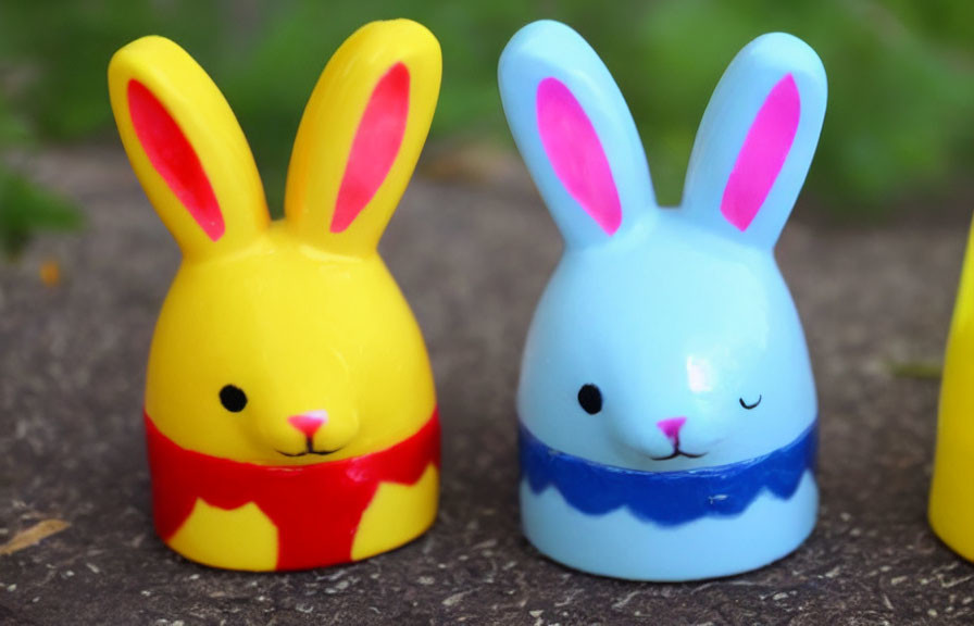 Colorful Rabbit-Shaped Figurines: Yellow and Blue, Painted Faces and Clothes, Sitting