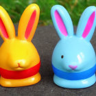 Colorful Rabbit-Shaped Figurines: Yellow and Blue, Painted Faces and Clothes, Sitting