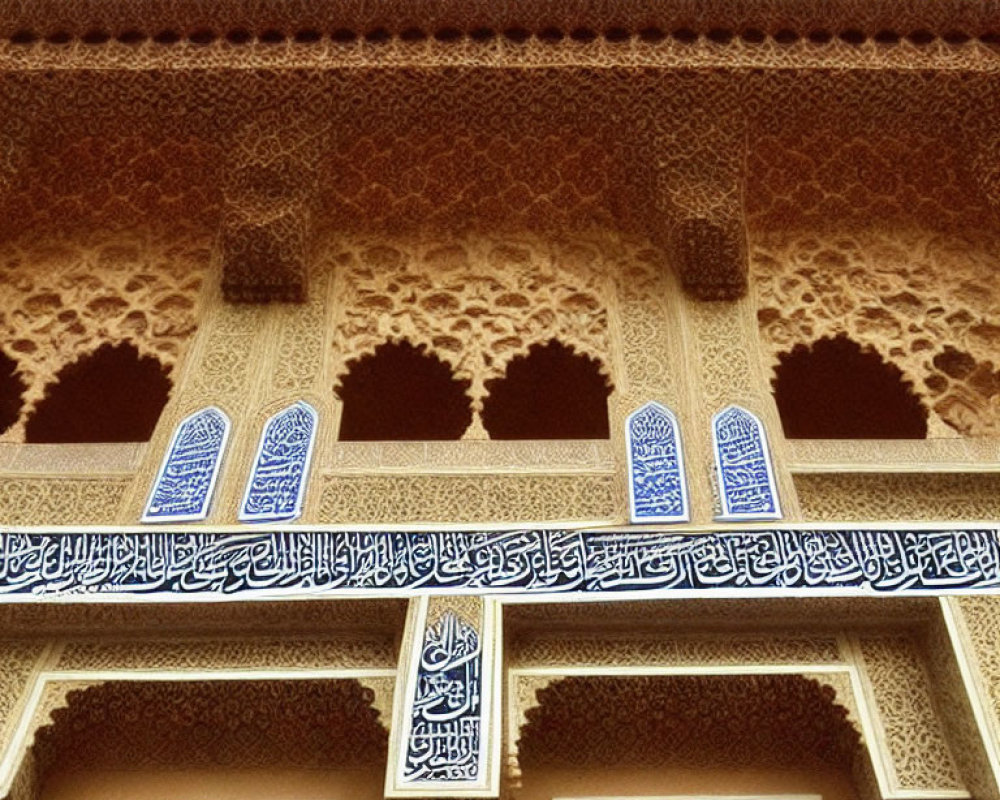 Historical building exterior: ornate arches, Islamic patterns, calligraphy.
