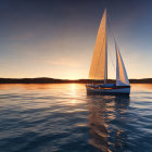 Sailboat on calm waters at sunset with reflections and clear sky gradating from orange to blue.