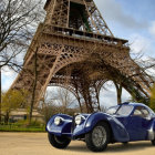 Eiffel Tower painting with vintage car in autumn landscape